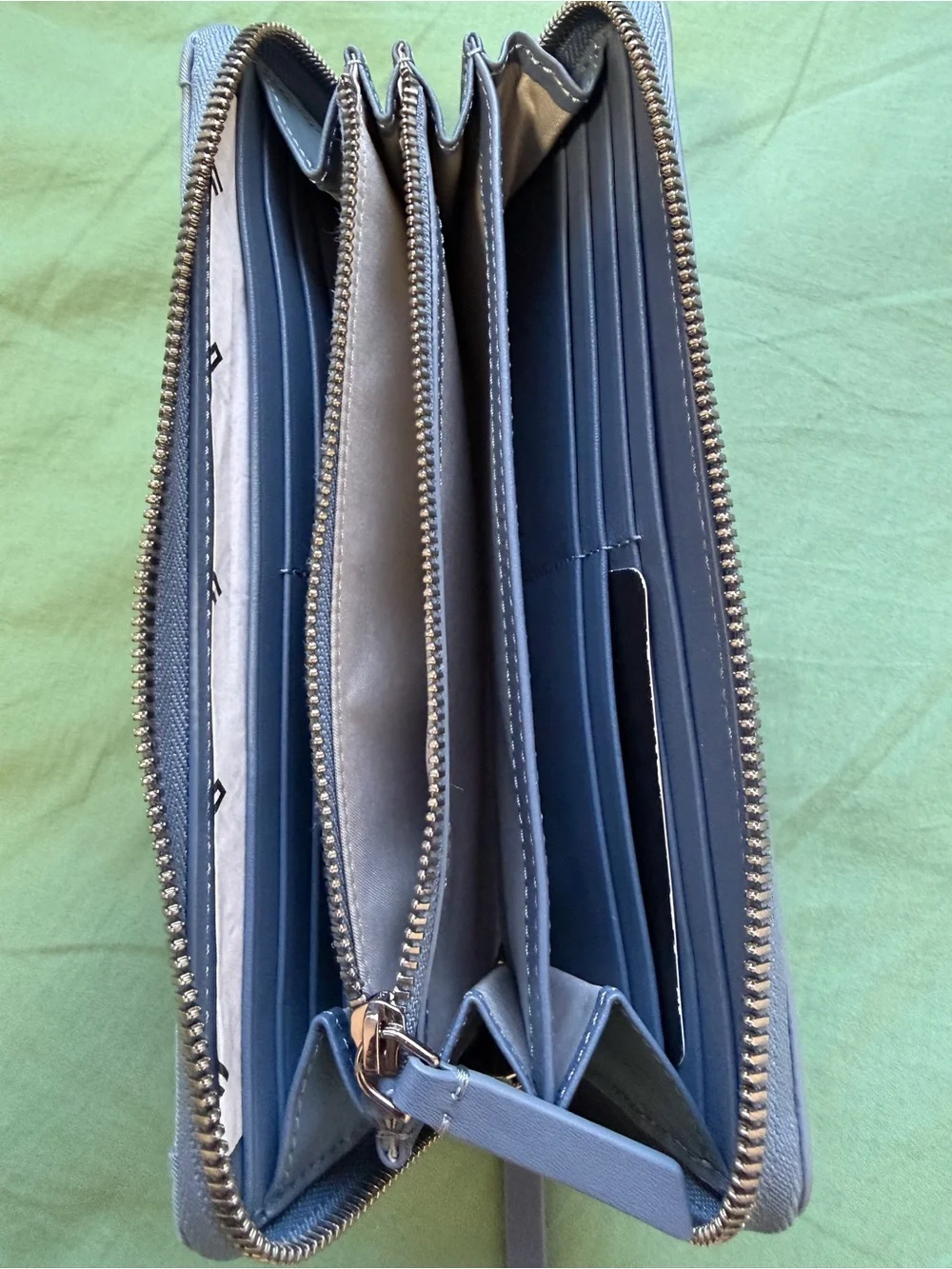 Tumi Pale Blue Zip-Around Wallet with Front Pocket